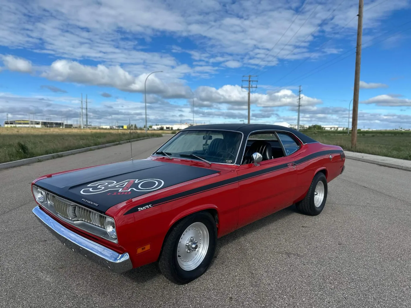 Red Plymouth Duster 340 with matte black hood, restored by NCC Classic